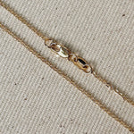 18k Gold Filled material and featuring a delicate 1.45mm width along with a charming moon bar pendant